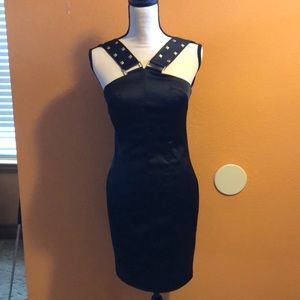 Black cocktail dress gold studs on straps
